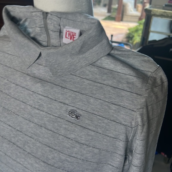 Adorable Lacoste long sleeve tee with collar and zip closure in back. Size S. - Picture 2 of 3